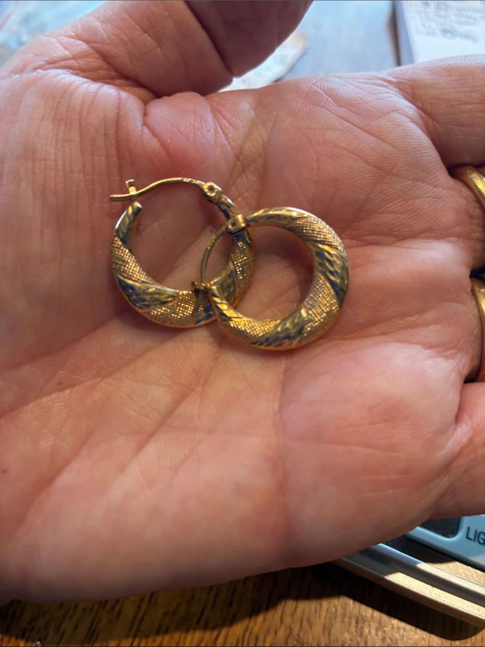 10K  Textured Hoop Earrings                
1.24 Grams.  1 Inch Diameter